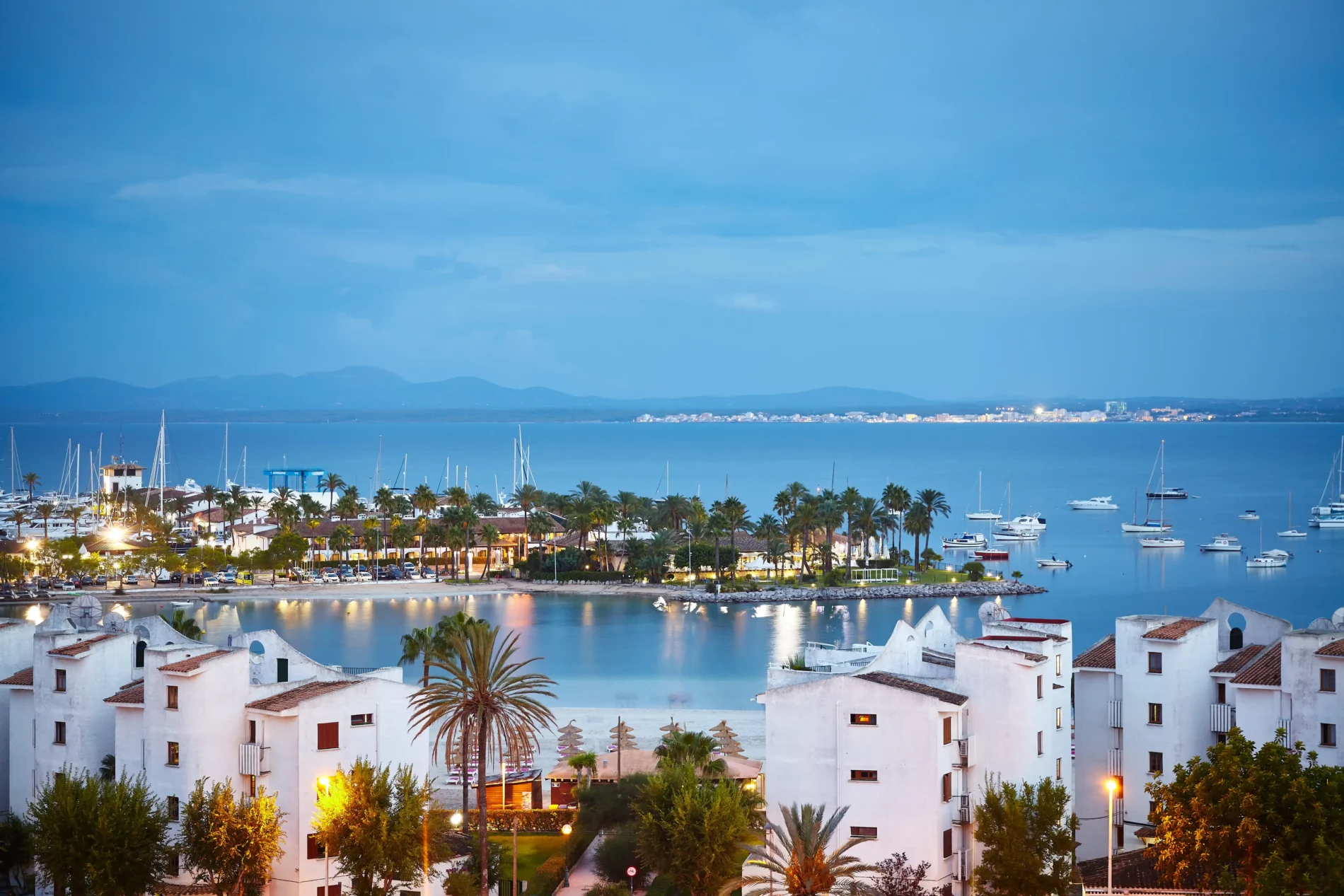 port-de-alcudia-at-sunrise-mallorca-2023-11-27-05-34-33-utc