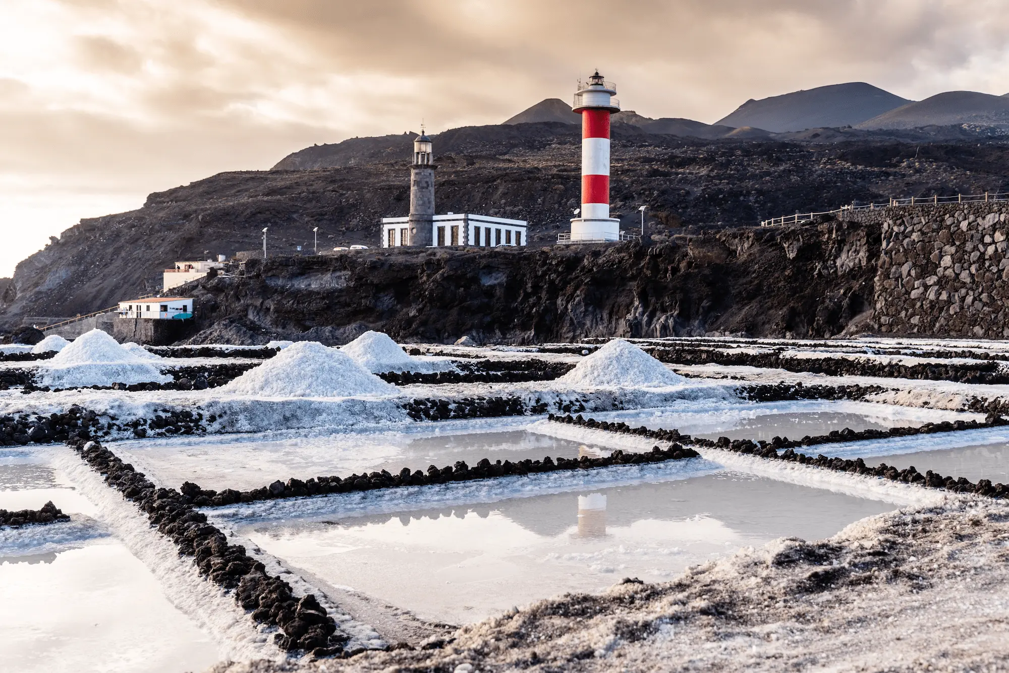 salt extraction and lighthouse in salinas of fuenc 2023 11 27 05 25 29 utc Faro de las Salinas and Cala Figuera: Two must-see stops in Southern Mallorca