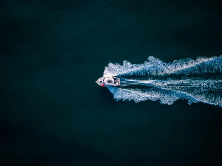 aerial-view-of-speed-motor-boat-on-open-blue-sea-2025-03-13-19-52-03-utc