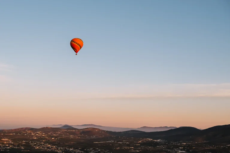colourful-hot-air-balloon-flying-above-the-mountai-2024-12-06-17-15-29-utc