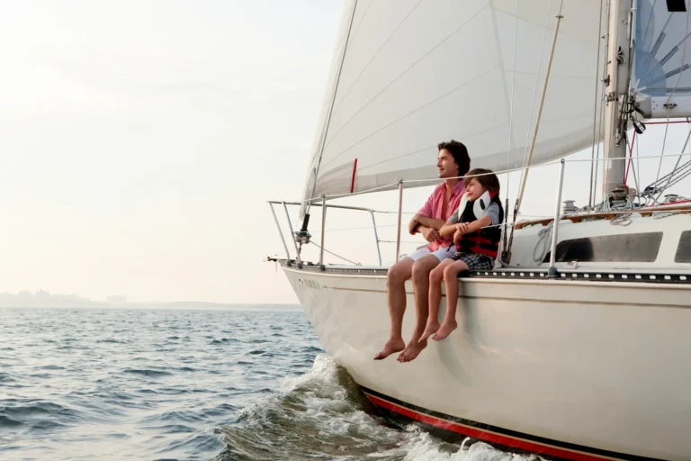 father-and-child-enjoying-a-serene-sailboat-ride-a-2024-05-28-18-25-42-utc