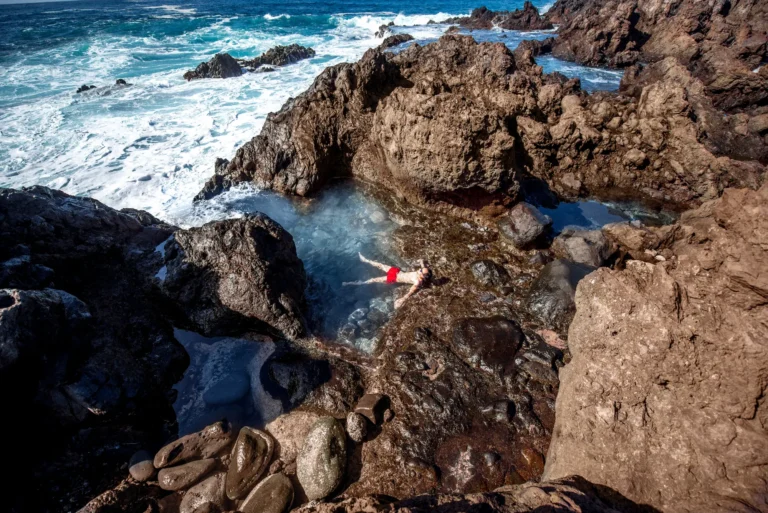 man-swimming-in-the-natural-pool-2025-03-13-02-36-03-utc