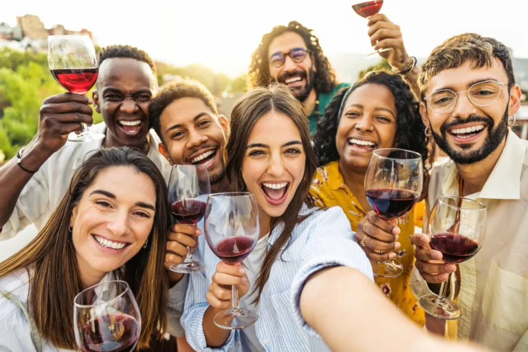 multiracial-friends-drinking-red-wine-outside-at-f-2025-02-10-11-16-15-utc
