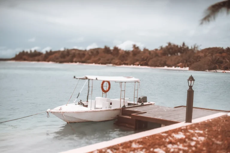 tiltshift-view-of-a-white-moored-motorboat-with-ma-2024-10-20-14-35-27-utc