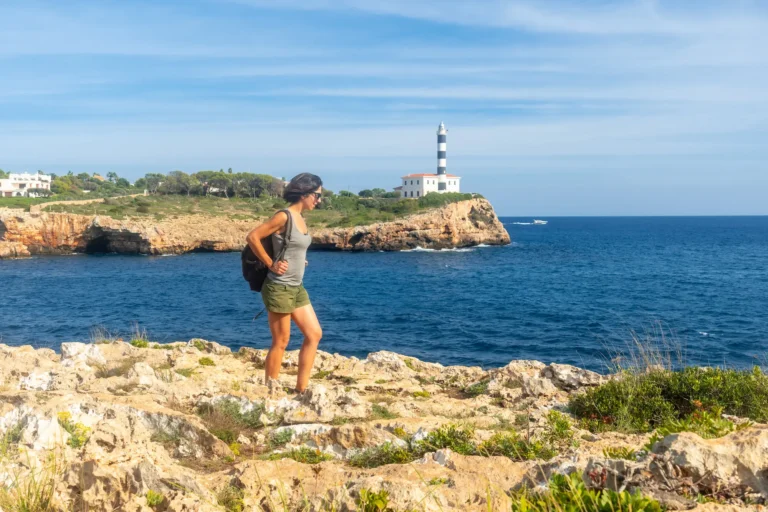 tourist-walking-near-the-portocolom-lighthouse-in-2025-01-16-13-48-56-utc