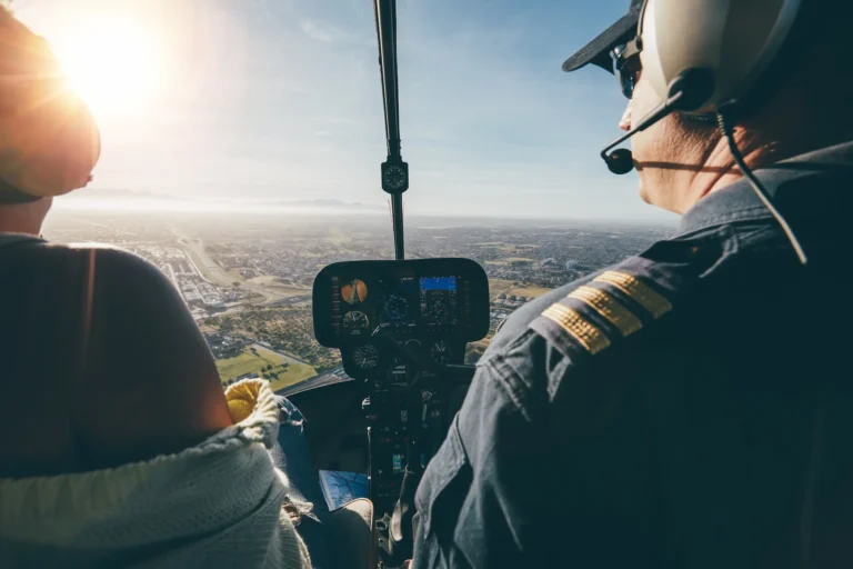 two-pilots-flying-a-helicopter-on-sunny-day-2024-09-16-14-29-23-utc