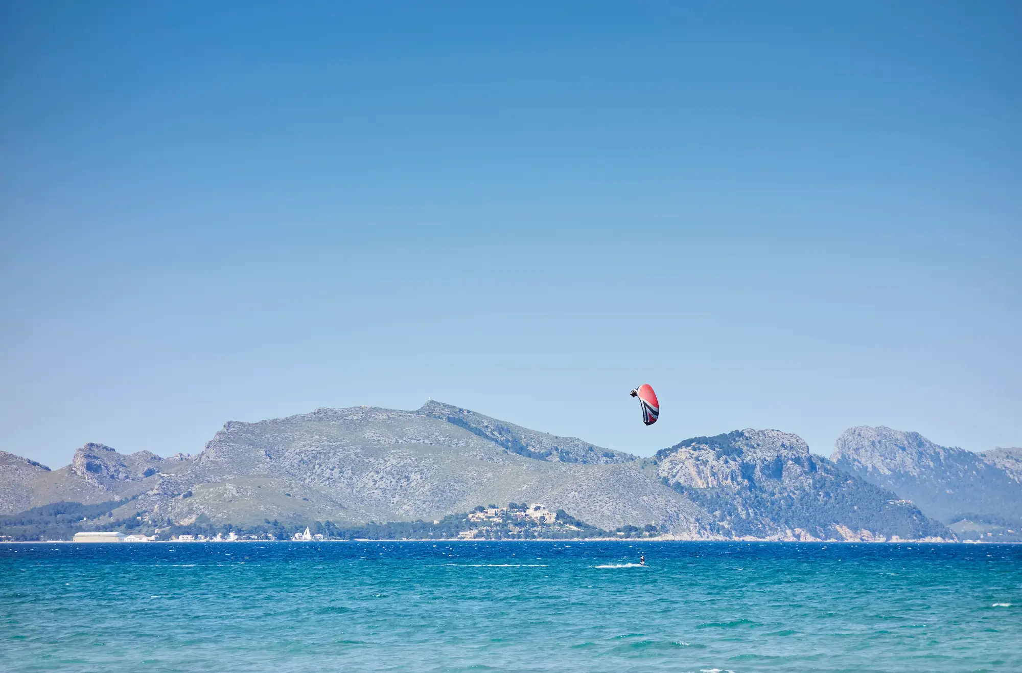 kitesurfer in sea majorca spain 2025 04 04 20 58 21 utc Mallorca for adventurers: 7 extreme activities to get your adrenaline pumping