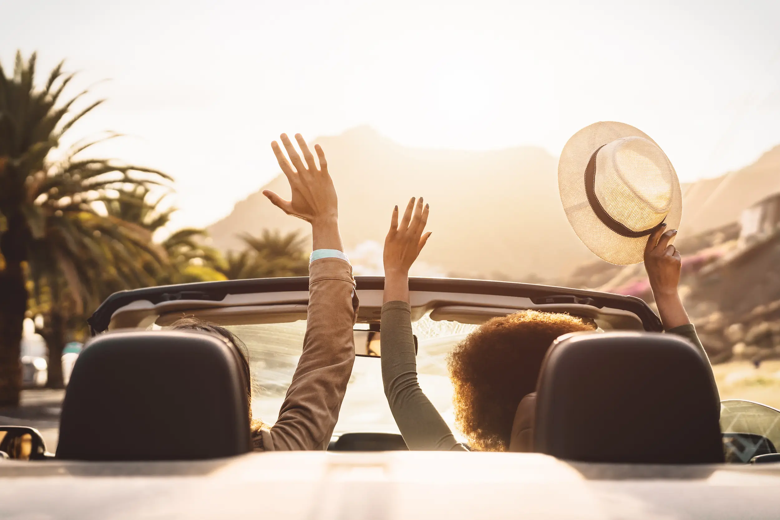 happy-young-couple-doing-road-trip-in-tropical-cit-2026-03-16-06-30-19-utc